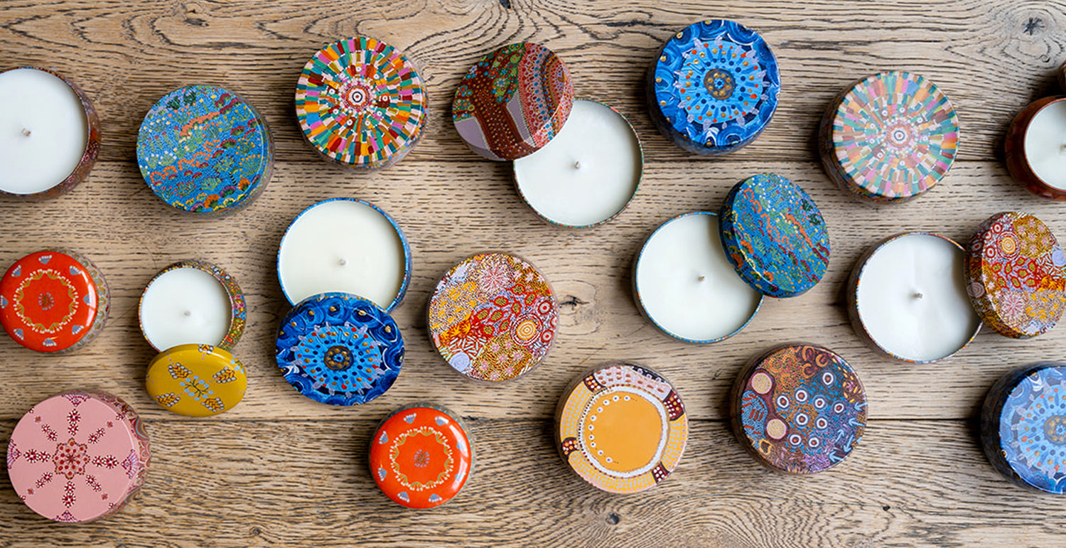 Australian Native Scented Candles from Koh Living, presented in Australian Aboriginal Art tins