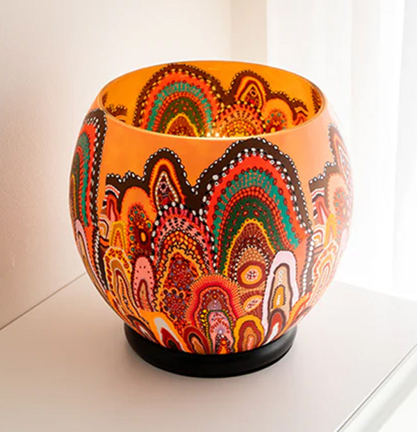 Electric Lamp with aboriginal design illuminated in the dark
