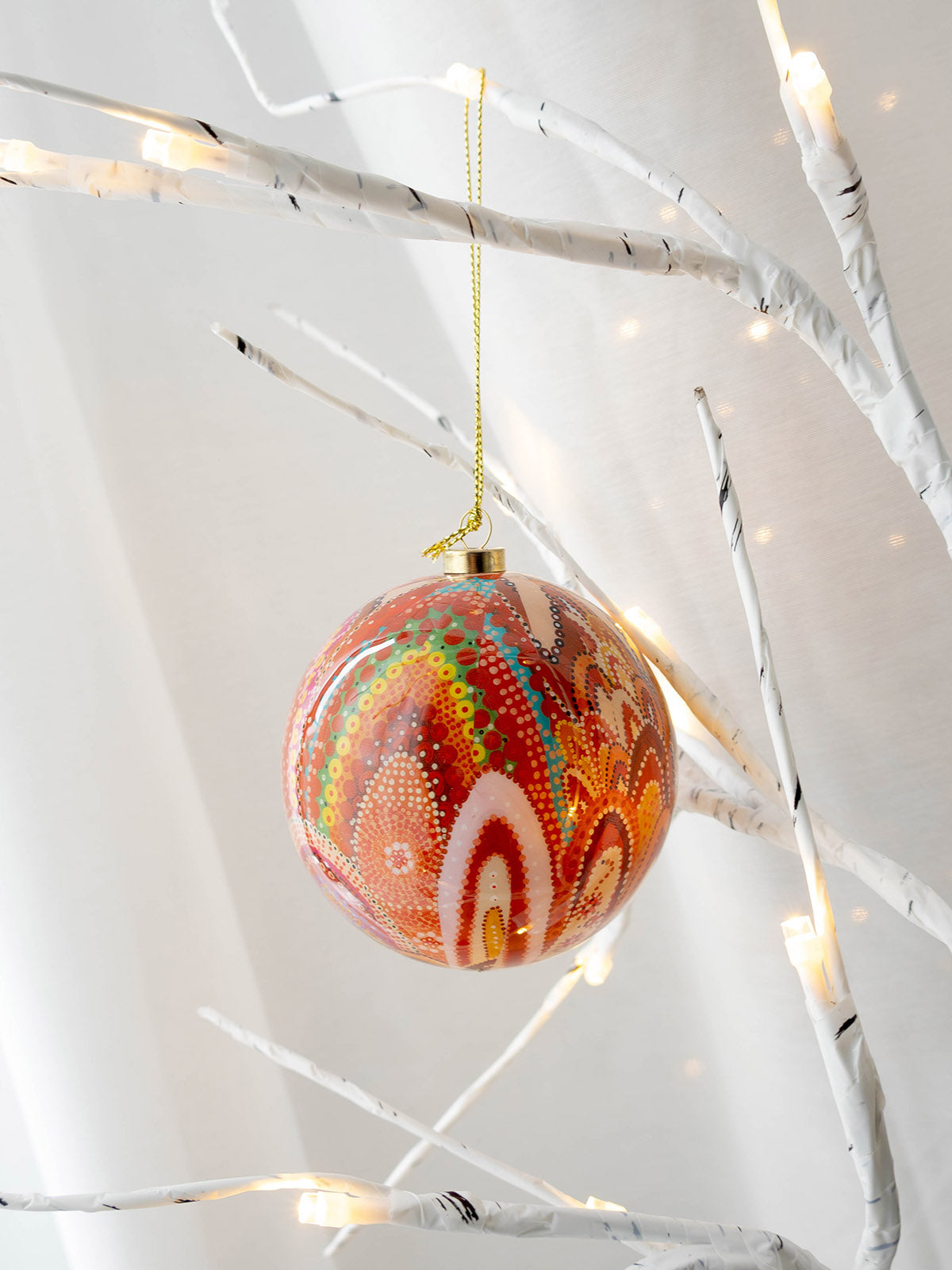 Beautiful Journey Indigenous Art Xmas Bauble hanging on Xmas tree