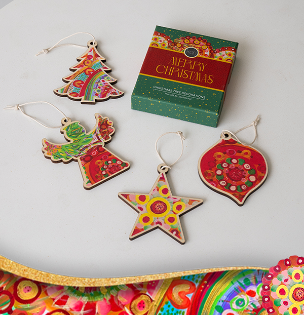 Wooden Christmas Decorations Australian themed with Aboriginal Art hanging on a Xmas tree