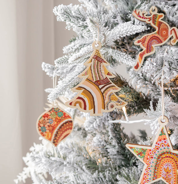 Wooden Christmas Decorations Australian themed with Aboriginal Art hanging on a Xmas tree
