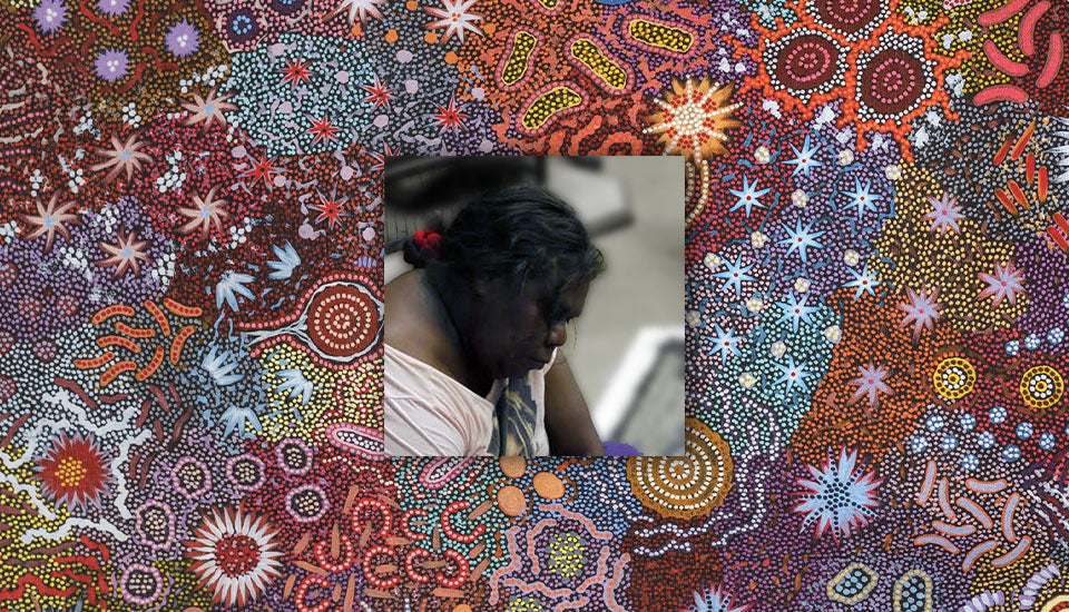 Picture of female Aboriginal artist and their art designs Michelle Possum