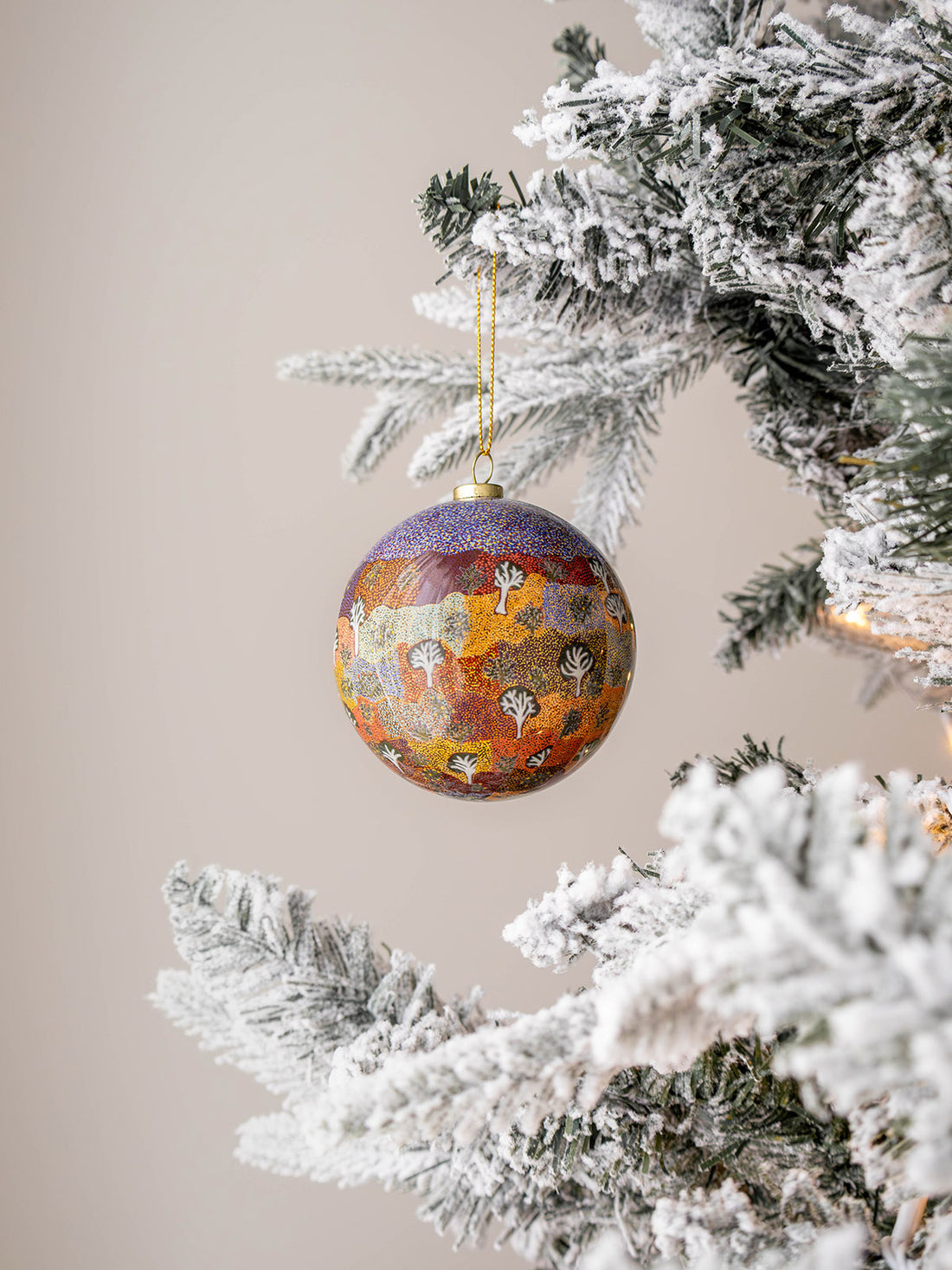 Aboriginal Australian Baubles For Christmas hanging on a tree from Koh Living