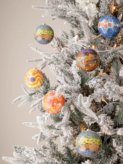 Sacred Country Aboriginal Art Baubles hanging on a Xmas tree