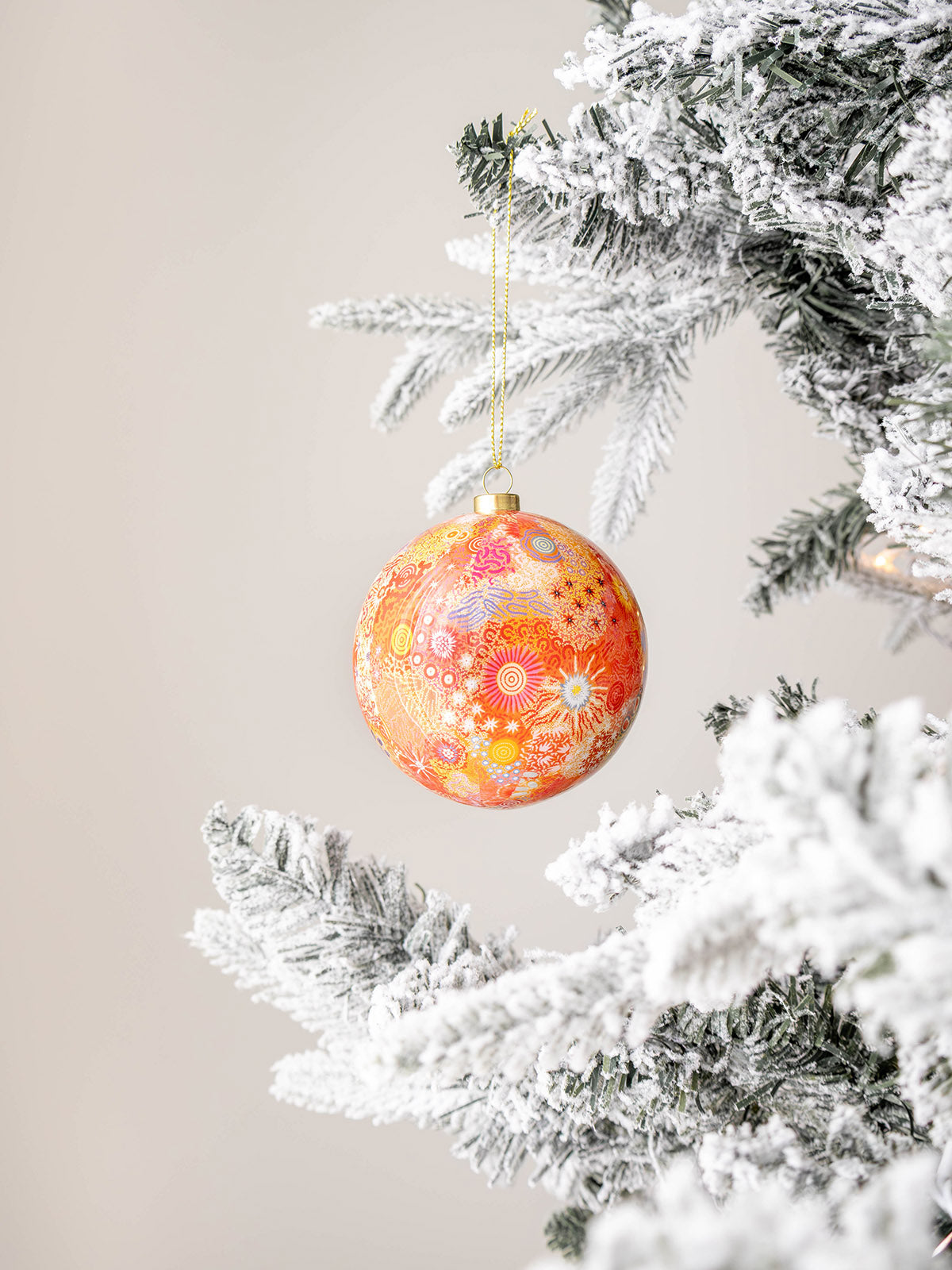 Unique Christmas bauble gift idea for 2023 - Aboriginal art bauble on tree