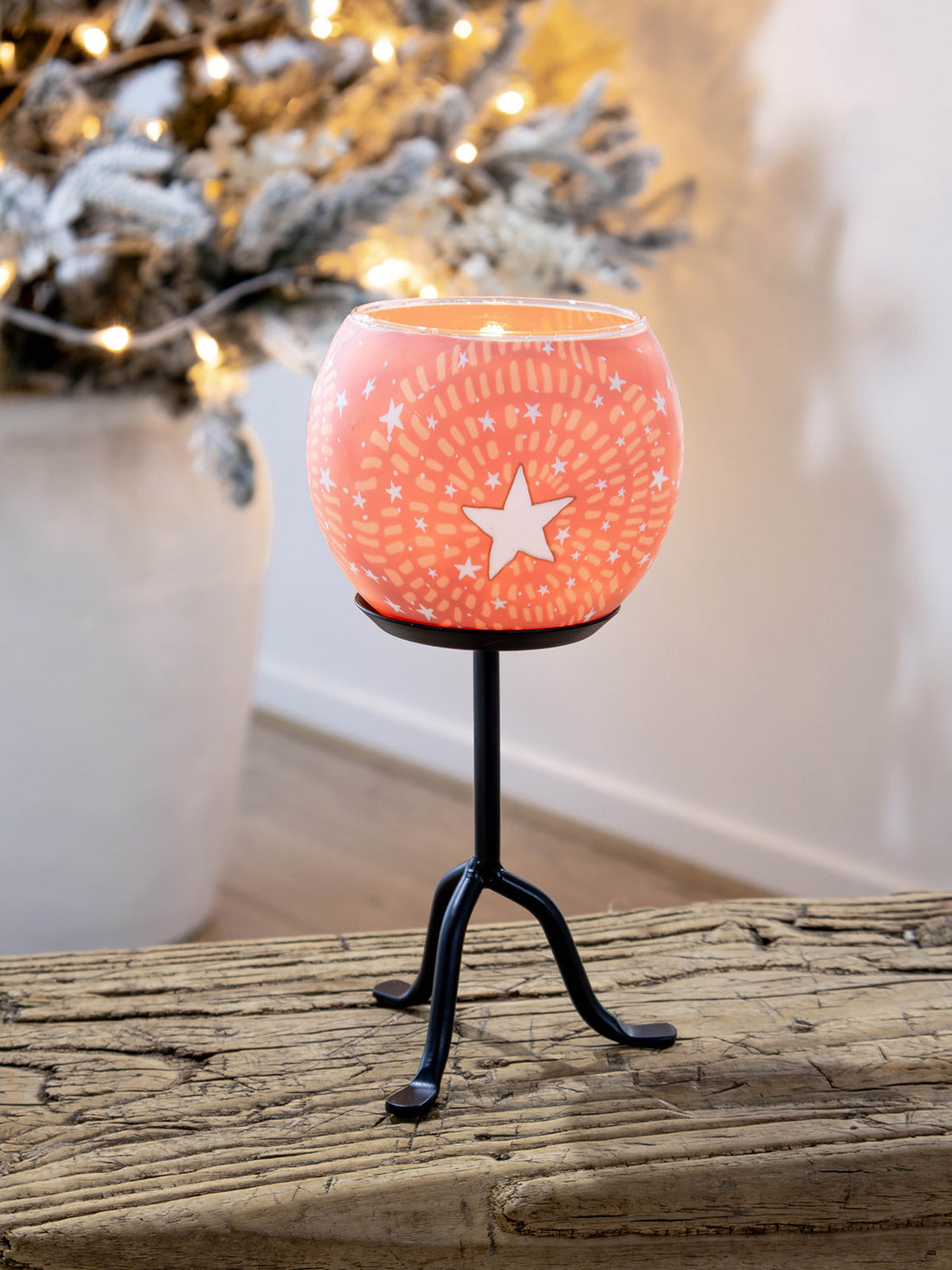 Christmas candle holder on cast iron stand with star design