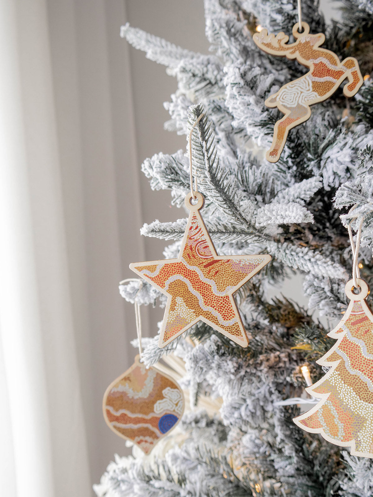 Christmas tree with Aboriginal Art Xmas Ornaments from Koh Living